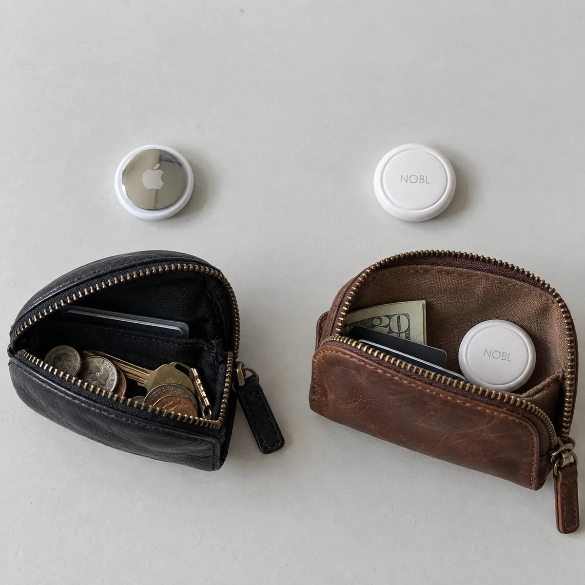 NOBL Air and AirTag shown beside travel pouches