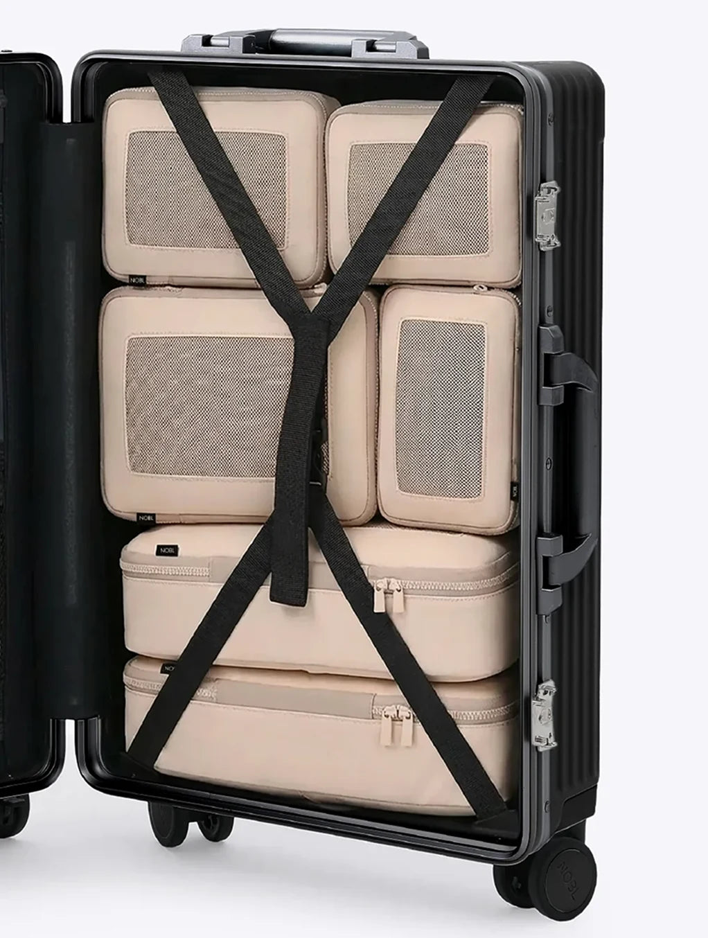 NOBL suitcase interior with compression straps